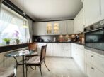 Gepflegte Maisonettewohnung mit Balkon und Stellplatz in Halstenbek - Küche