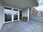 Barrierefreie KfW 55 Wohnung mit Balkon & Tiefgaragenstellplatz - Laubengang zu der Wohnung