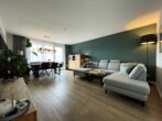 Barrierefreie KfW 55 Wohnung mit Balkon & Tiefgaragenstellplatz - Wohnbereich