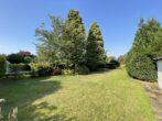 Doppelhaushälfte mit Erweiterungspotenzial in Osdorf - Gartenansicht vom Haus