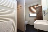 Seltene Gelegenheit in Heiligenhafen – Exklusive Ferienwohnung mit traumhaftem Wasserblick - Badezimmer