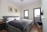 Seltene Gelegenheit in Heiligenhafen – Exklusive Ferienwohnung mit traumhaftem Wasserblick - Schlafzimmer