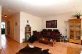 Familienfreundliche Maisonettewohnung in ruhiger Lage von Hamburg-Sasel - Wohnzimmer