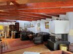 Traumhafter U-Bungalow in Oldendorf mit großem Naturgrundstück - Wohnzimmer