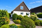 Wunderschönes Einfamilienhaus mit großzügiger Terrasse und idyllischem Garten in Quickborn-Heide - Vorderansicht