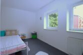 Wohnen auf zwei Ebenen mit eigenem Garten und sonniger Terrasse - Kinderzimmer