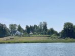 Einmalige Gelegenheit: Schleigrundstück im ruhigen Privatweg! - Blick von der Schlei Richtung Grundstück