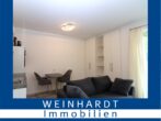 Helle, stilvoll möblierte 2-Zimmer-Wohnung mit Südausrichtung & in bester Lage - Wohnzimmer