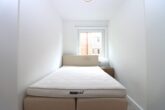 Helle, stilvoll möblierte 2-Zimmer-Wohnung mit Südausrichtung & in bester Lage - Schlafzimmer