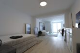 Möblierte 1-Zimmer Wohnung in Hamburg-Harvestehude - Wohnbereich