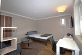 Möblierte 1-Zimmer Wohnung in Hamburg-Harvestehude - Wohnbereich