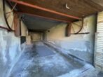 Einfamilienhaus mit Schwimmbad, Vollkeller und Baupotenzial auf großem Grundstück in Pinneberg - Garage