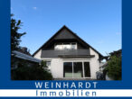 Schönes Zweifamilienhaus mit Garten in ruhiger Lage von Hamburg-Hausbruch - Titel
