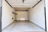 Komplett renovierte 4-Zimmer-Wohnung mit großzügigem Balkon und idyllischem Blick ins Grüne - Garage
