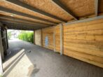 Einfamilienhaus mit großem Grundstück in absolut ruhiger Lage von Tornesch - Carport mit E-Ladesäule