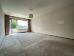 Zentrale 3-Zimmer Wohnung mit Tiefgaragenstellplatz - Wohnzimmer