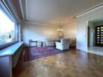Charmantes, freistehendes Einfamilienhaus mit großem Garten in Norderstedt - Wohnzimmer