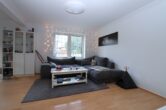 Helle 3-Zimmer-Erdgeschosswohnung mit Terrasse und Stellplatz in Niendorf - Wohnzimmer