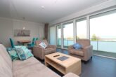 Exklusive Ferienwohnung mit traumhaftem Wasserblick - Wohnzimmer