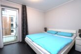 Exklusive Ferienwohnung mit traumhaftem Wasserblick - Schlafzimmer
